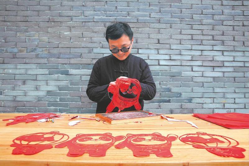 非遗剪纸为冬奥会加油