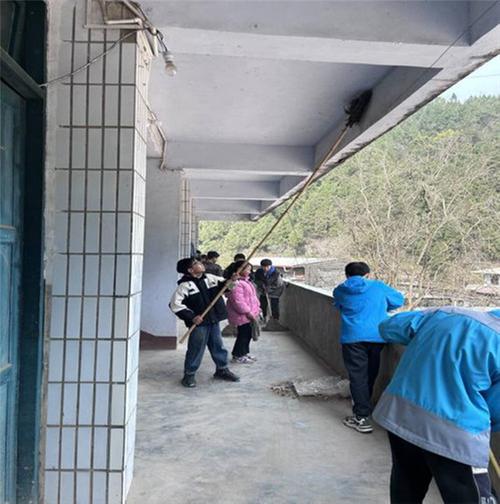 南江县关门镇九义校开展“传承雷锋精神，参与志愿服务”活动